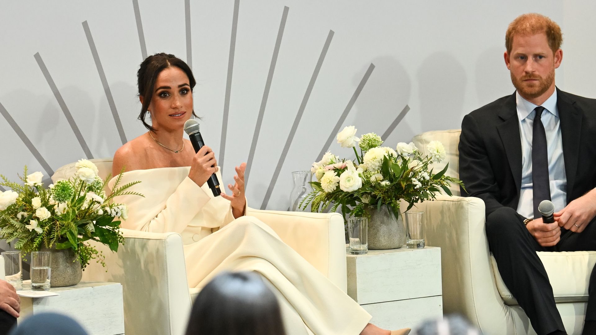 Harry and Meghan on stage at Archewell Foundation mental health summit