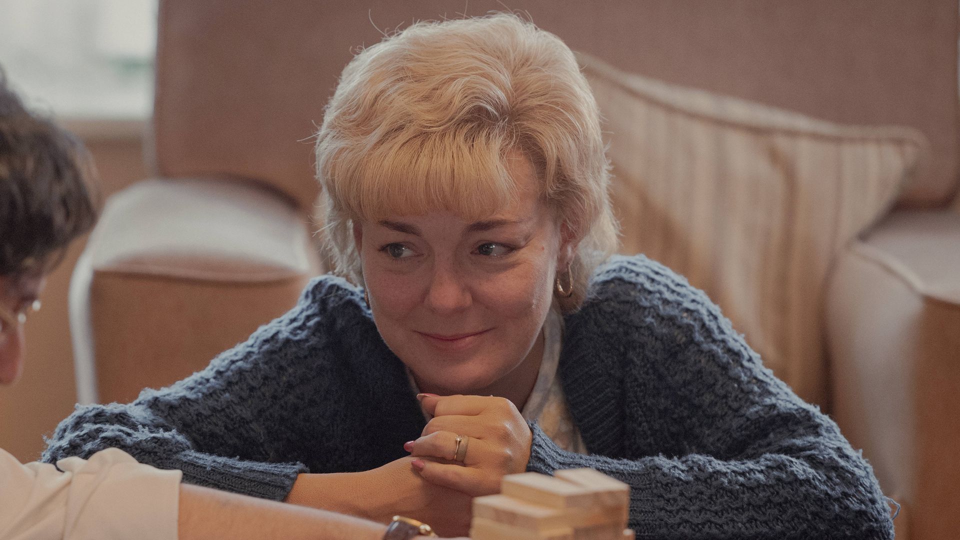 man and woman in living room