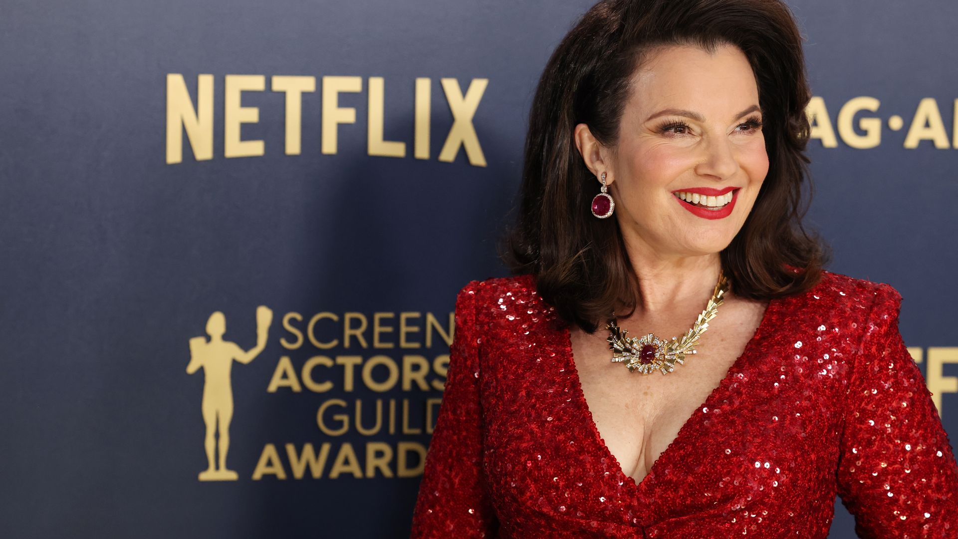 SAG president Fran Drescher, 66, looks incredible as she steals the show in plunging red gown