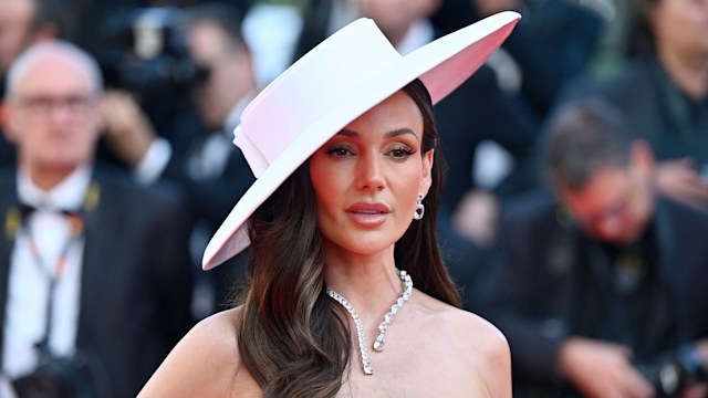 Michelle Keegan shoulders up in white hat
