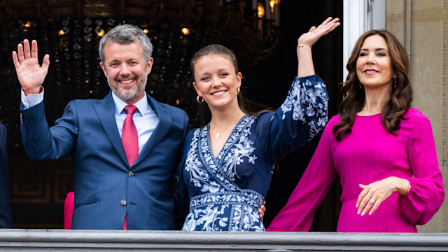 King Frederik, Princess Isabella and Queen Mary waving from balcony