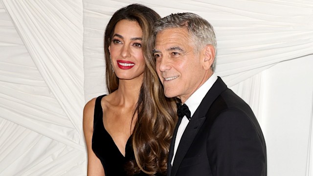 Amal Clooney and George Clooney in black tie