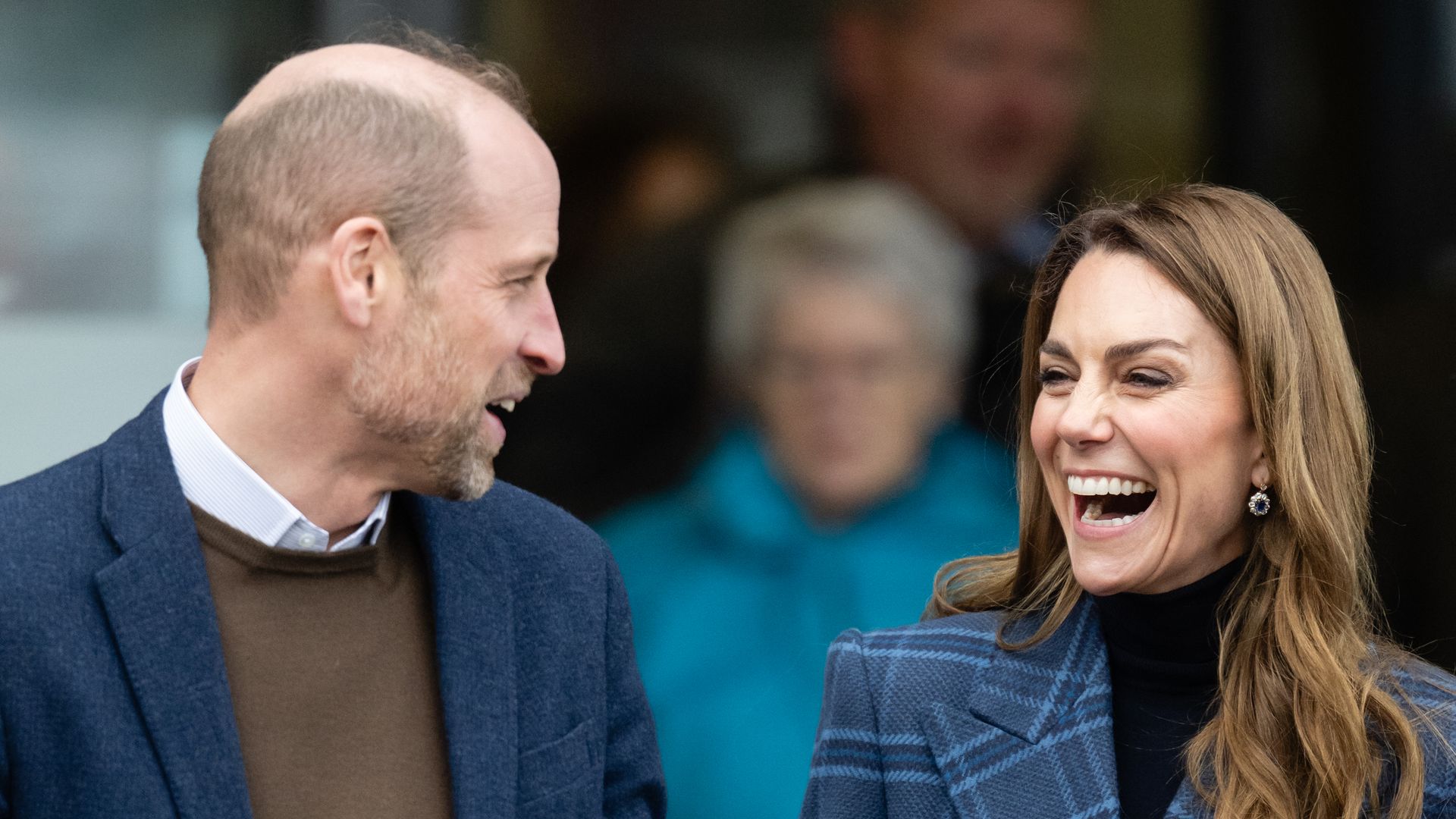 Prince William and Kate smiling at each other