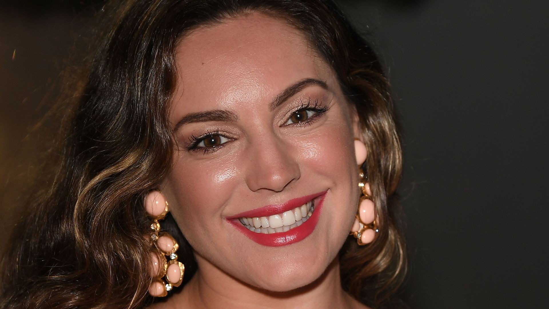 Kelly Brook just wore the most flattering striped bikini we ever saw