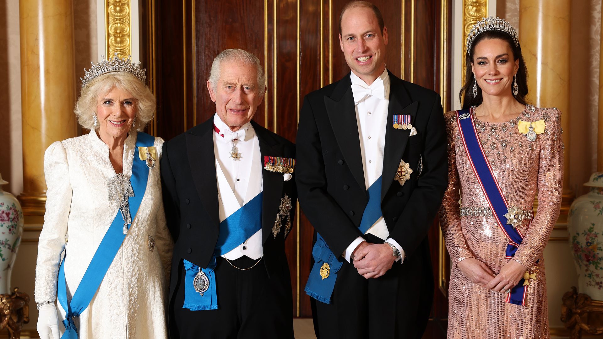 Queen Camilla, King Charles III, Prince William, Prince of Wales and Catherine, Princess of Wales pose for a photograph at Buckingham Palace