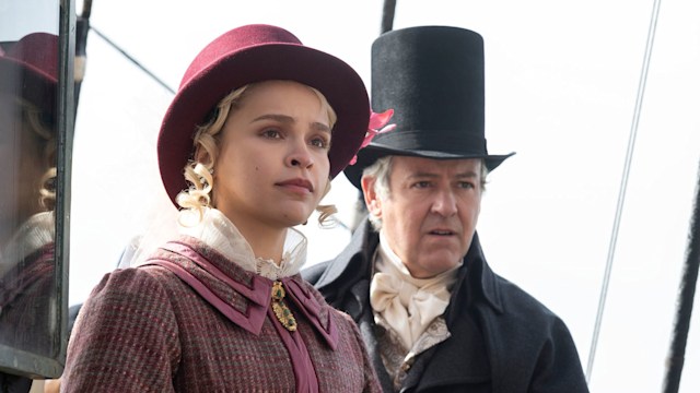 man and woman in period clothing