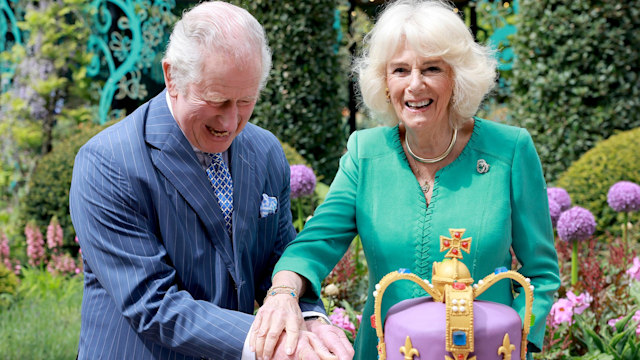 Queen Camilla and King Charles cutting cake