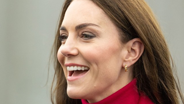 kate middleton up close laughing gold earrings