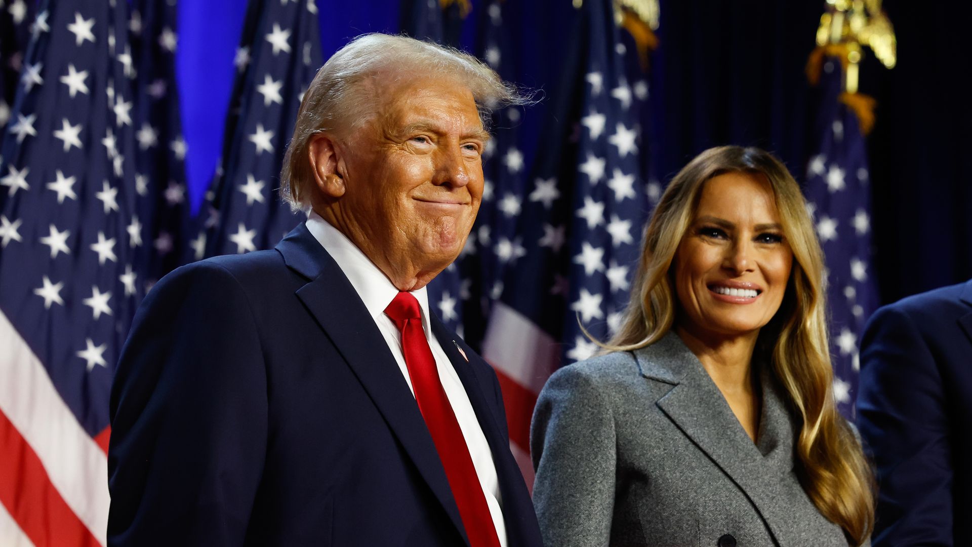 Donald Trump and former first lady Melania Trump look on during an election night event at the Palm Beach Convention Center on November 06, 2024 in West Palm Beach, Florida