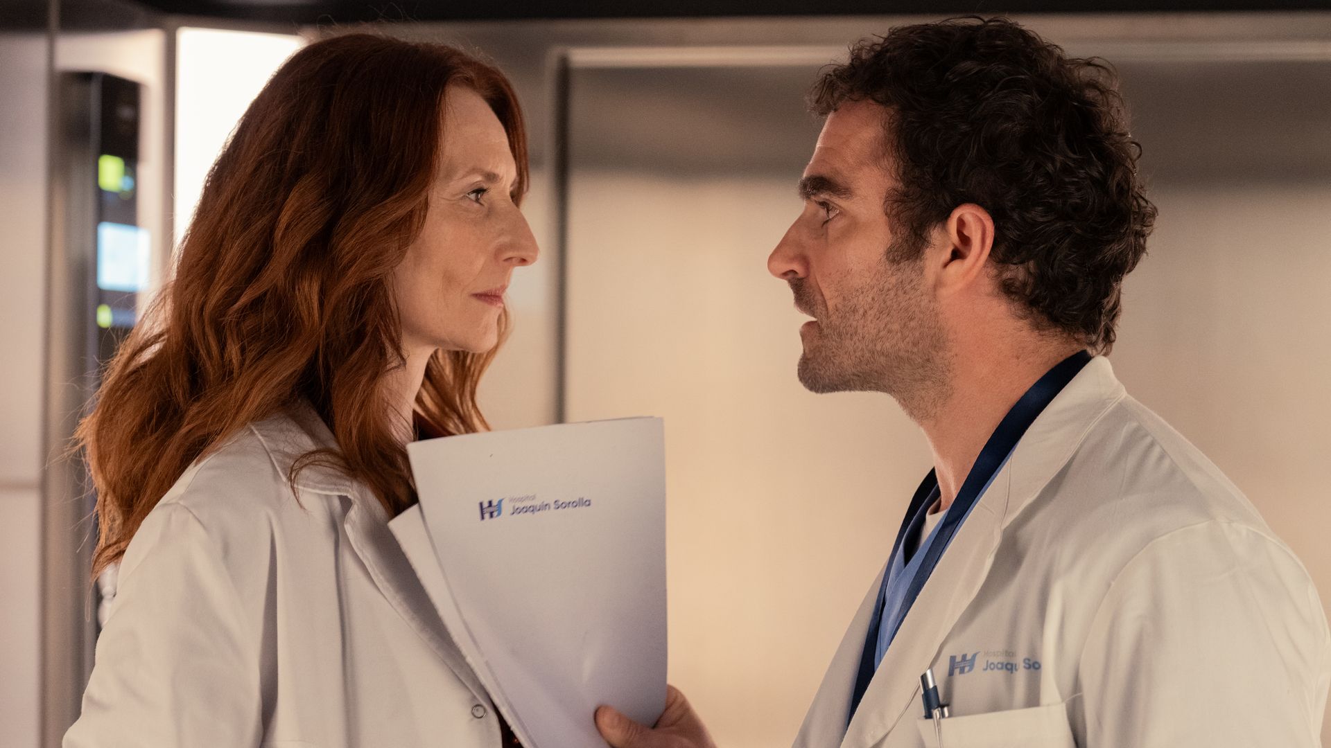 man and woman in white coats