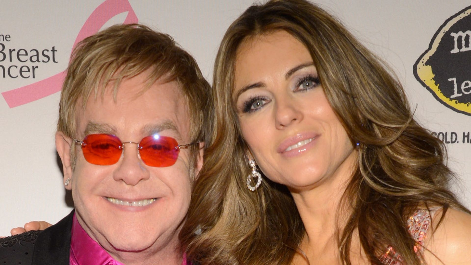 Elton John and Elizabeth Hurley attend the Breast Cancer Foundation's Hot Pink Party 
