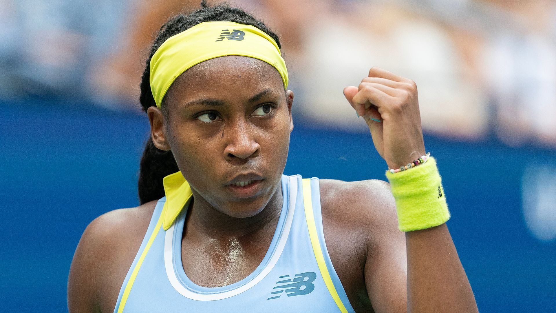Coco Gauff reacts to winning a point during her fourth round match against Emma Navarro