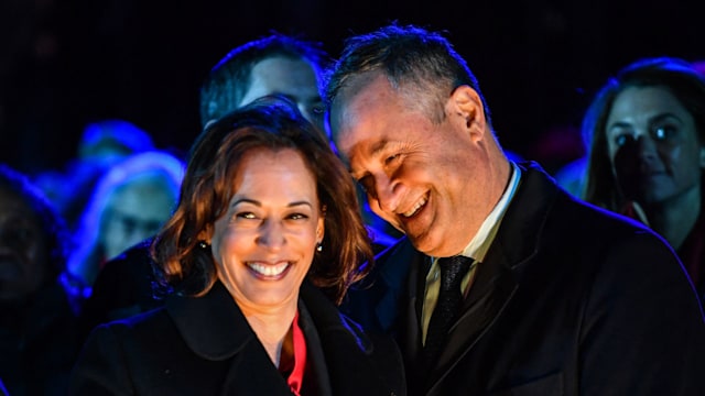 US Vice President Kamala Harris (L) and Second Gentleman Doug Emhoff attend the 100th National Christmas Tree Lighting in 2022