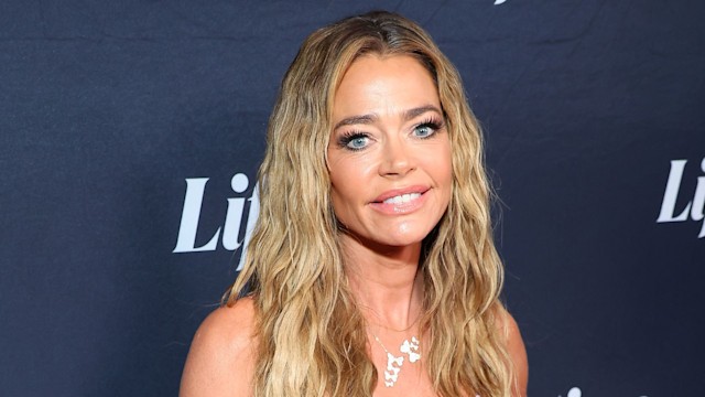 denise richards red carpet wearing floral dress