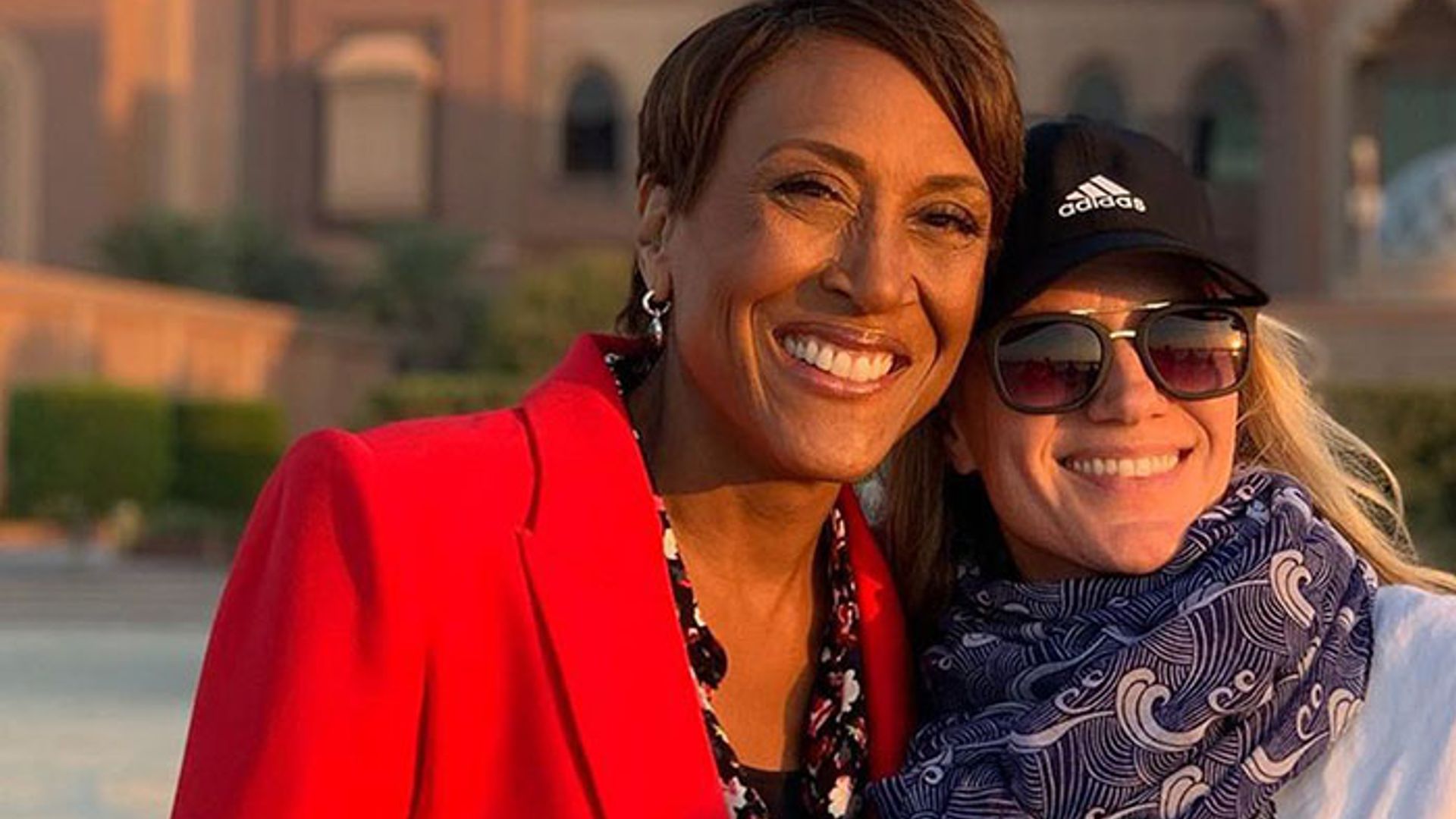robin roberts with amber laign outside