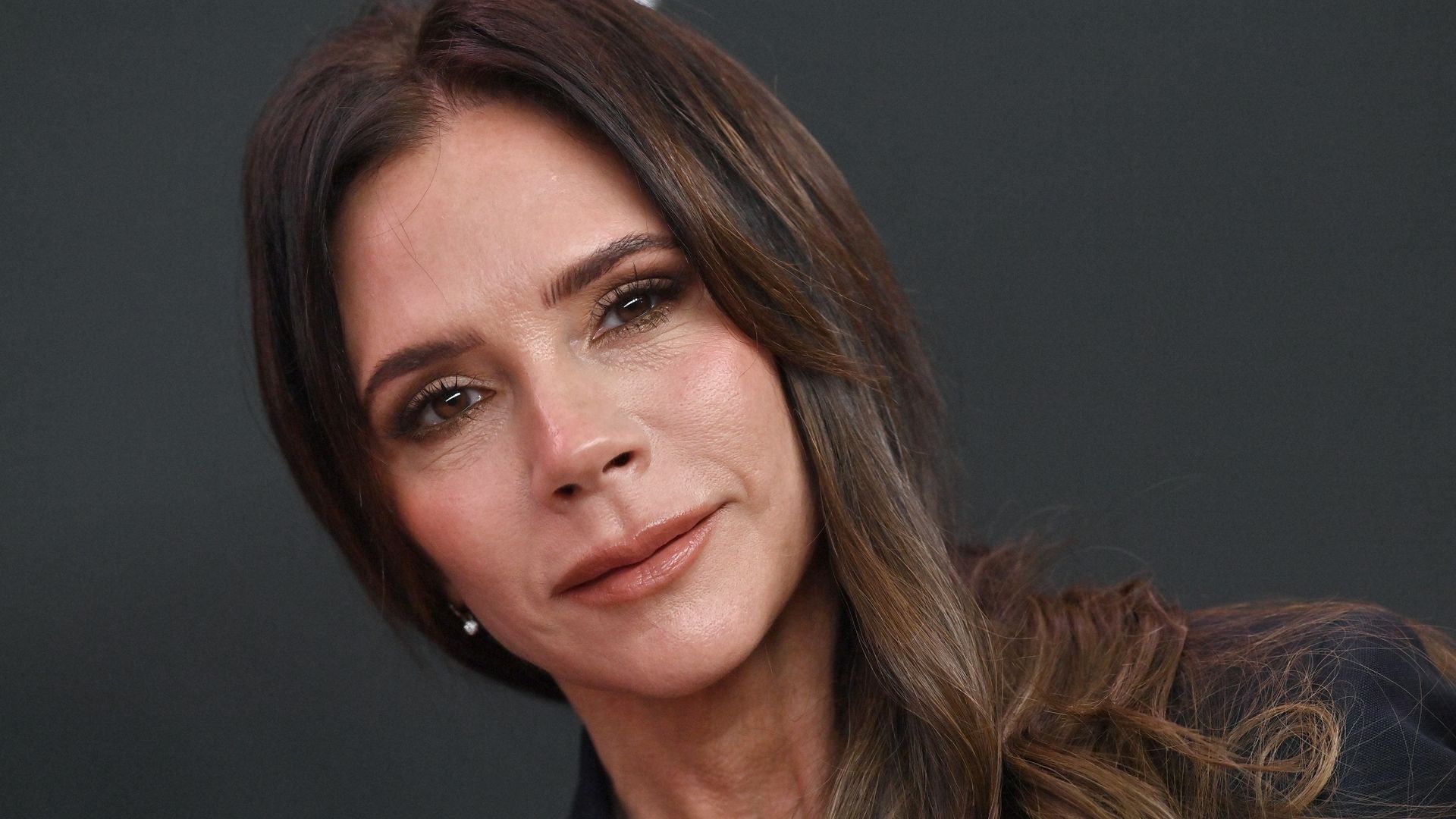Victoria Beckham stuns in classic slip dress to announce 'love affair'