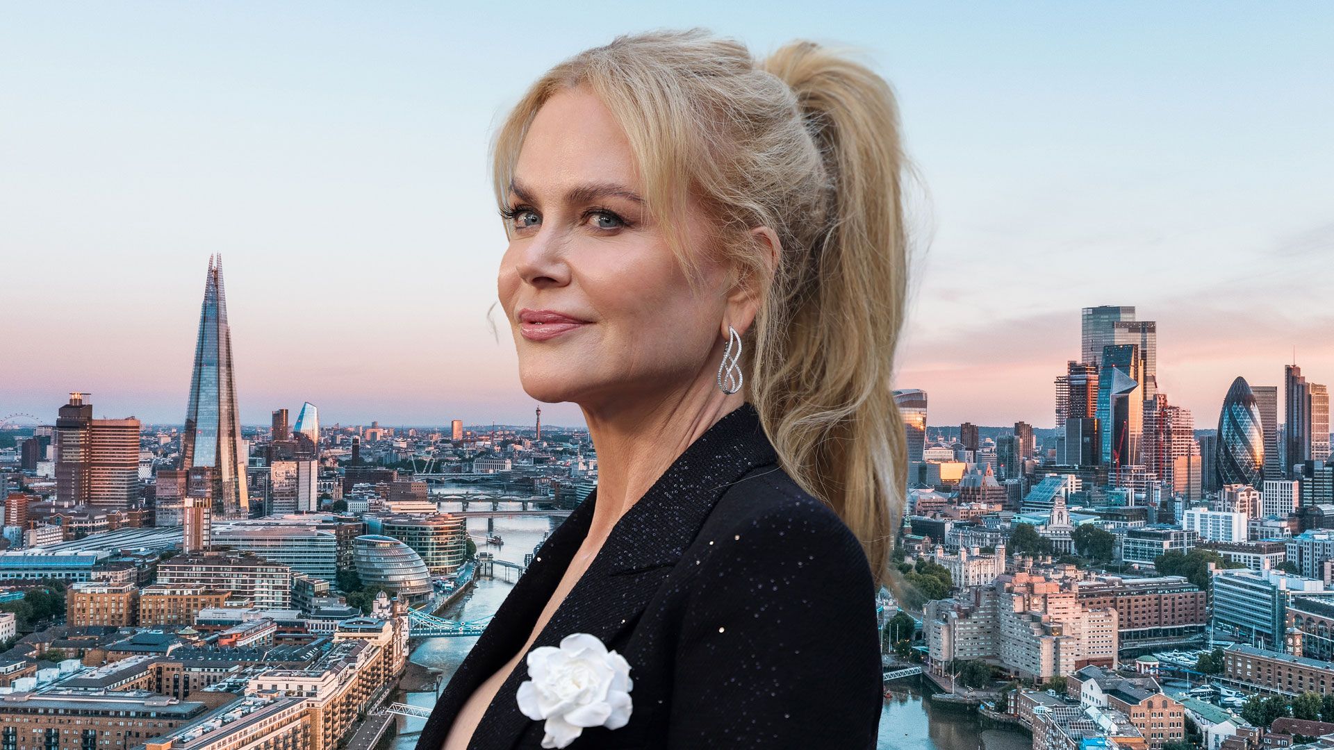Nicole Kidman side on with ponytail with london skyline backdrop