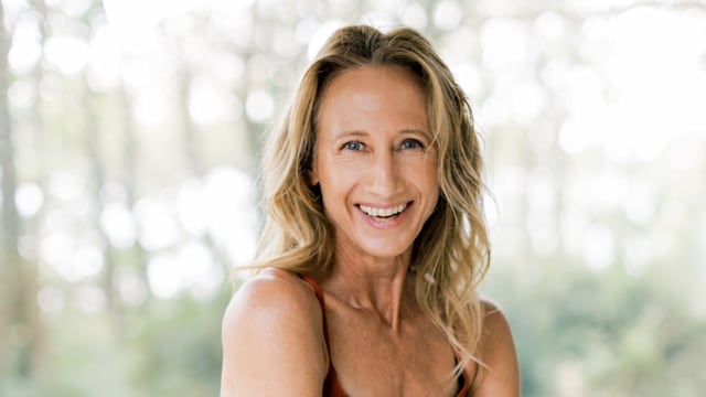 woman smiling in gymwear