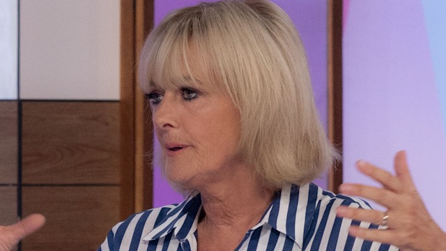Jane Moore in a blue and white striped dress on Loose Women