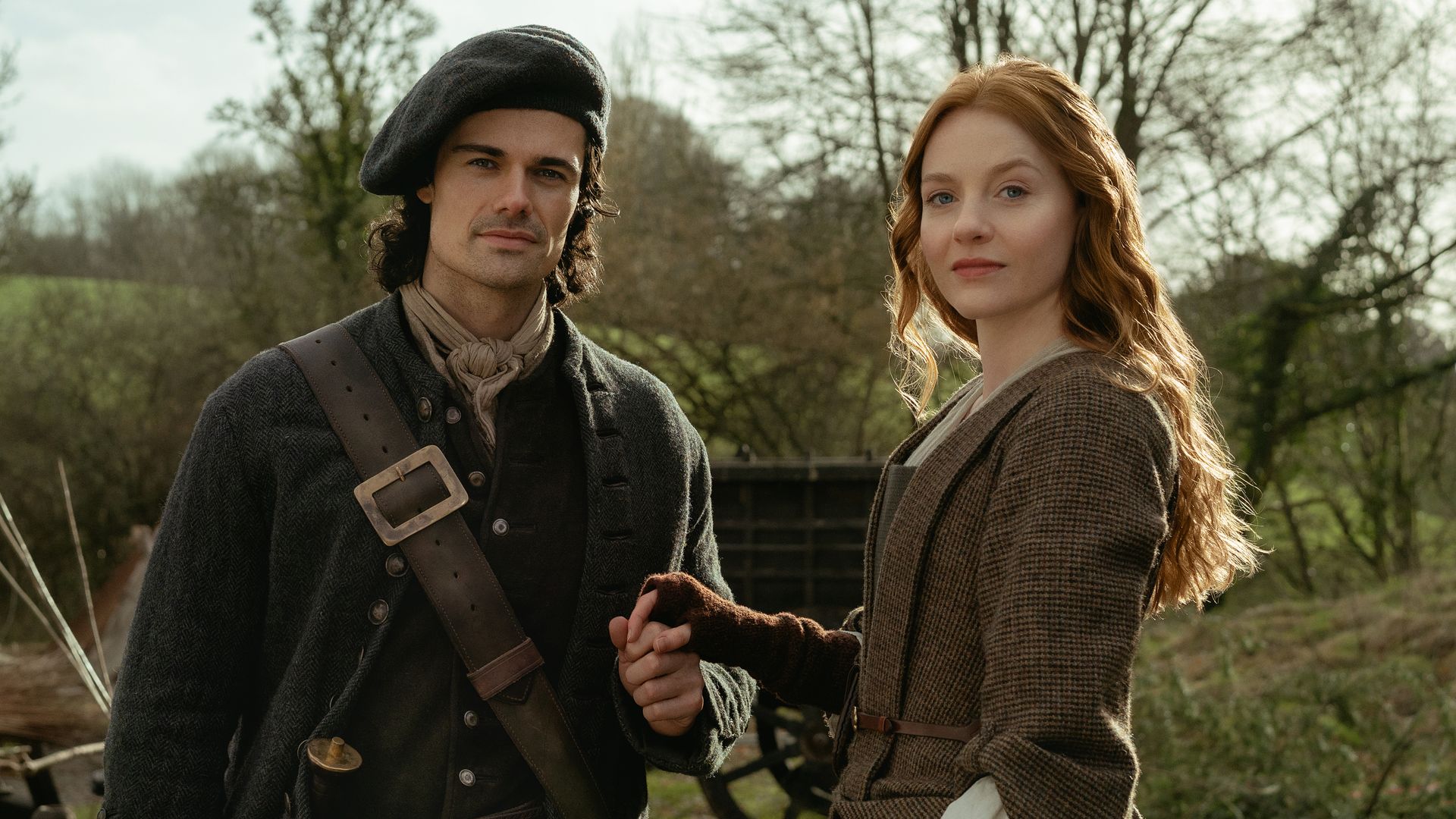 man and woman in 18th century clothing