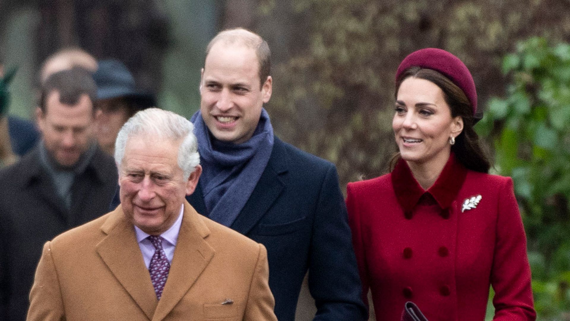 King Charles walking with Prince William and Kate Middleton