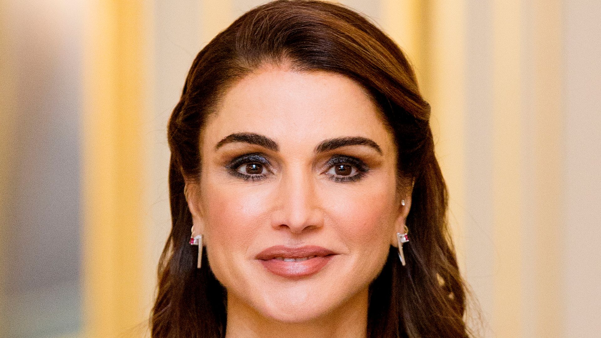 Queen Rania cradles baby granddaughter in heartwarming photos