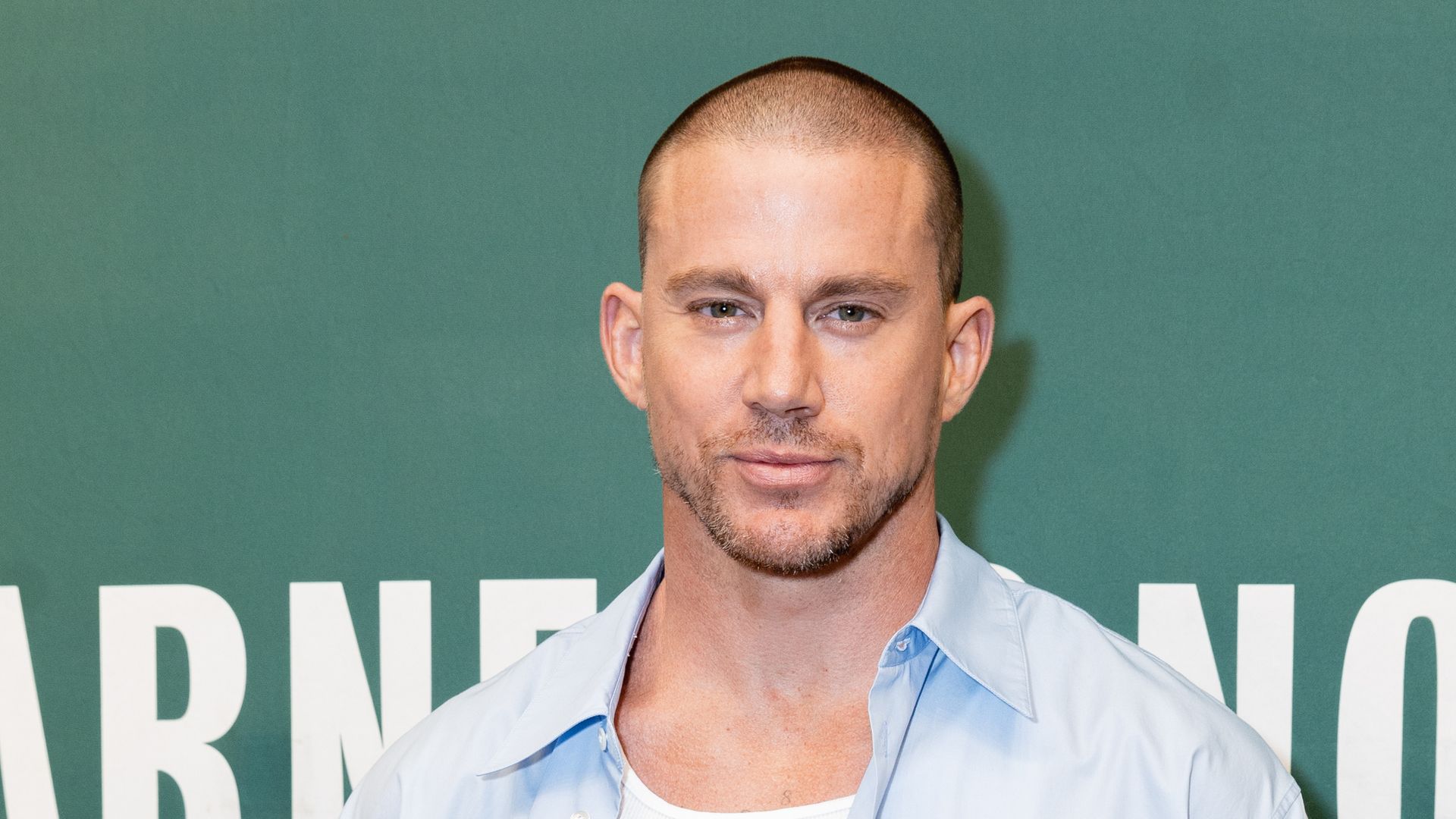 Channing Tatum poses for a photo before he signs copies of his new children's book "The One and Only Sparkella Makes A Plan" at Barnes & Noble at The Grove on June 01, 2022 in Los Angeles, California
