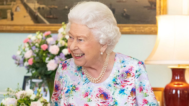 the queen in floral dress