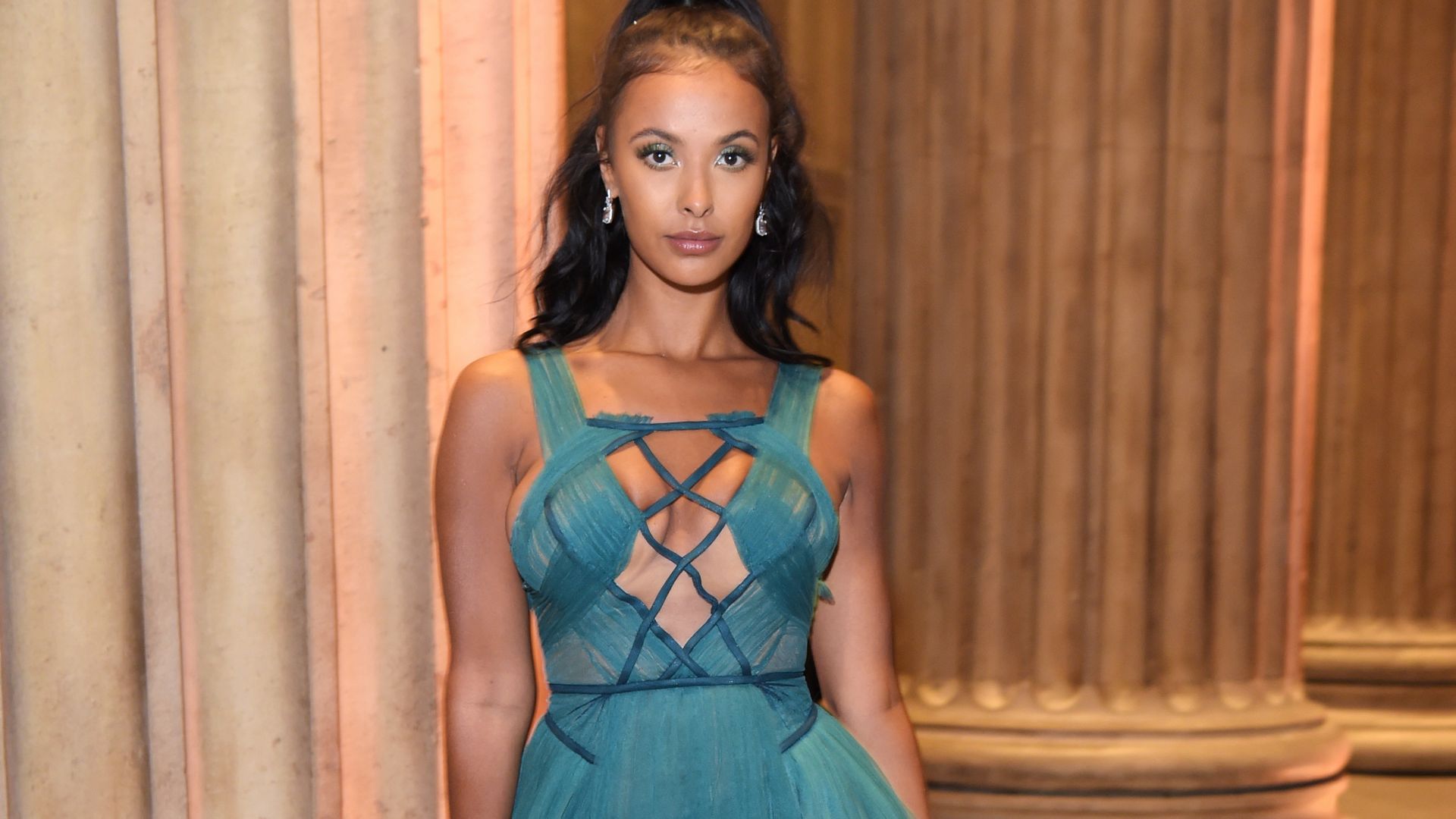 Maya Jama’s cut-out midi dress is the bolt of beach-chic we needed