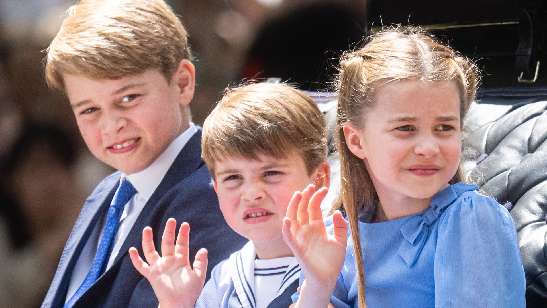 Prince George of Wales, Prince Louis of Wales and Princess Charlotte of Wales ride in a carriage during Trooping The Colour, the Queen's annual birthday parade, on June 02, 2022 in London, England.
