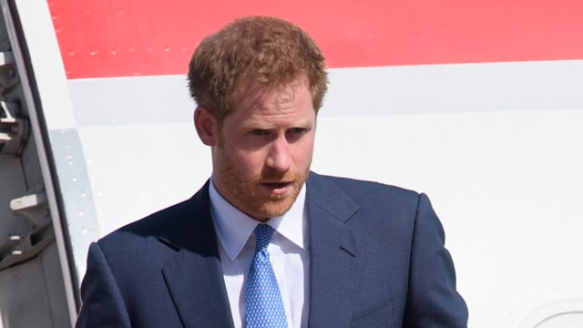 Prince Harry getting off a plane