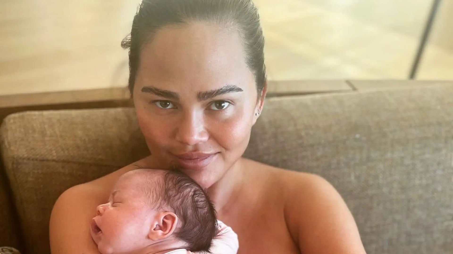 Chrissy Teigen shares nude photo with body-positive message after giving birth to her third child