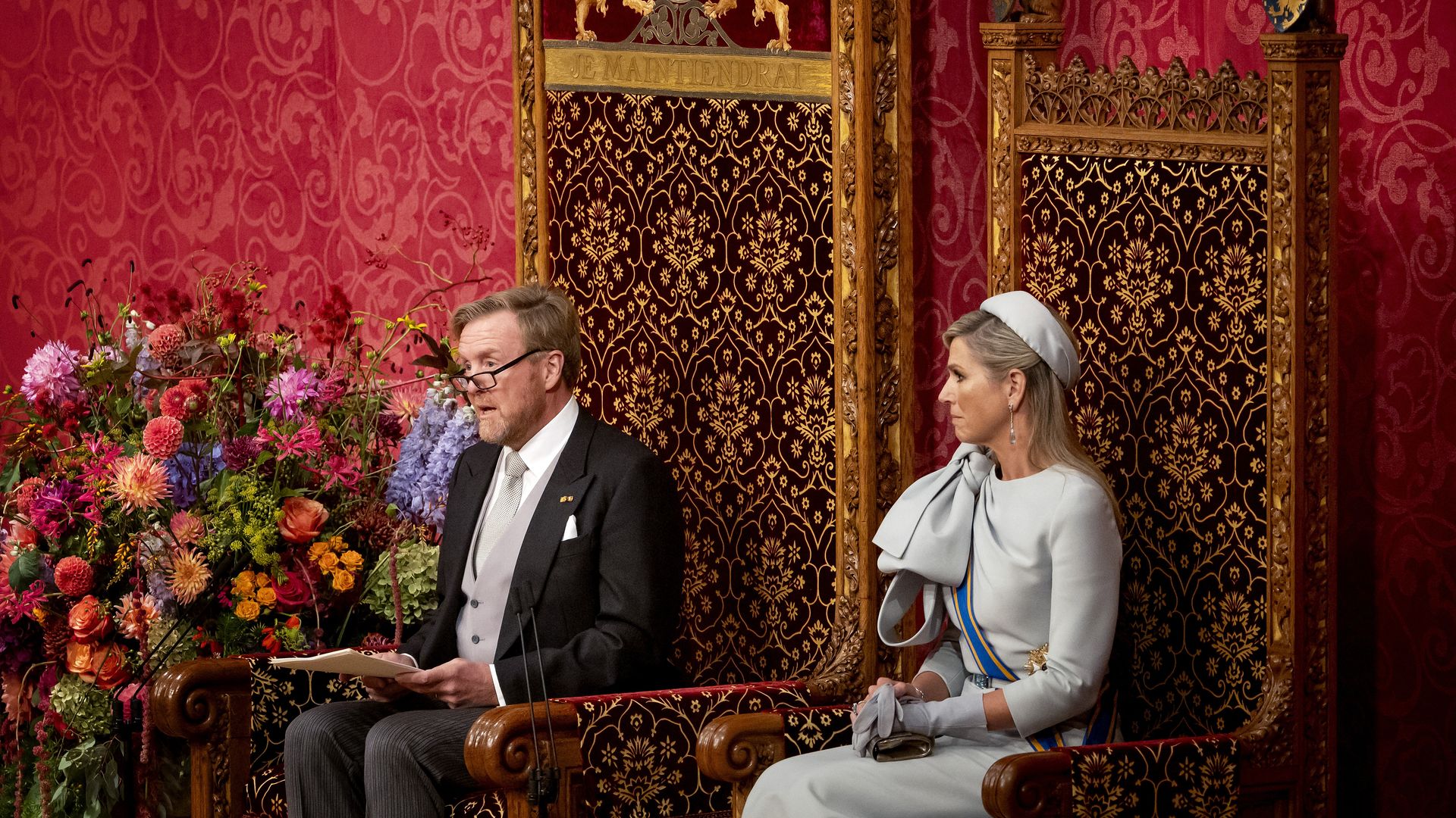 King Willem-Alexander, flanked by Queen Maxima, reads the Speech from the Throne to members of the Dutch Senate and House of Representatives at the Royal Theater