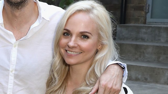 David Tennant in a shirt and Georgia Tennant in a white dress outside