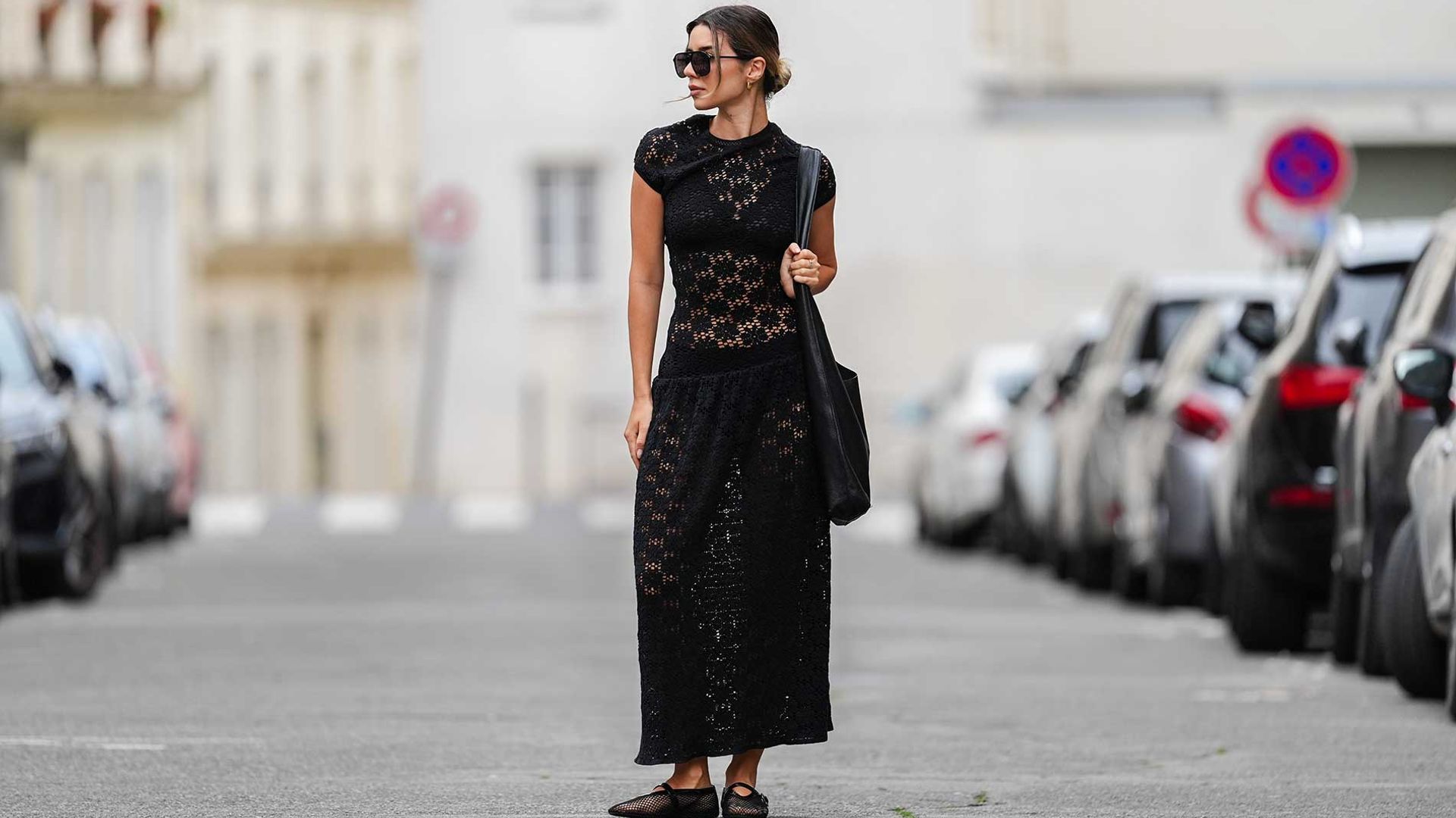Katie Giorgadze wearing a black dress in Paris