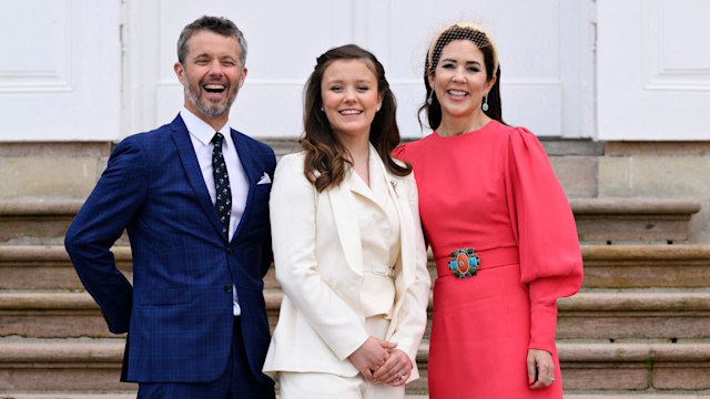 Princess Isabella laughing with King Frederik and Queen Mary