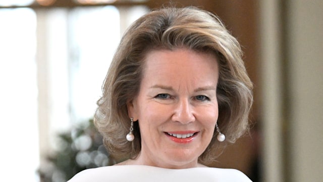 Queen Mathilde waist up in white top