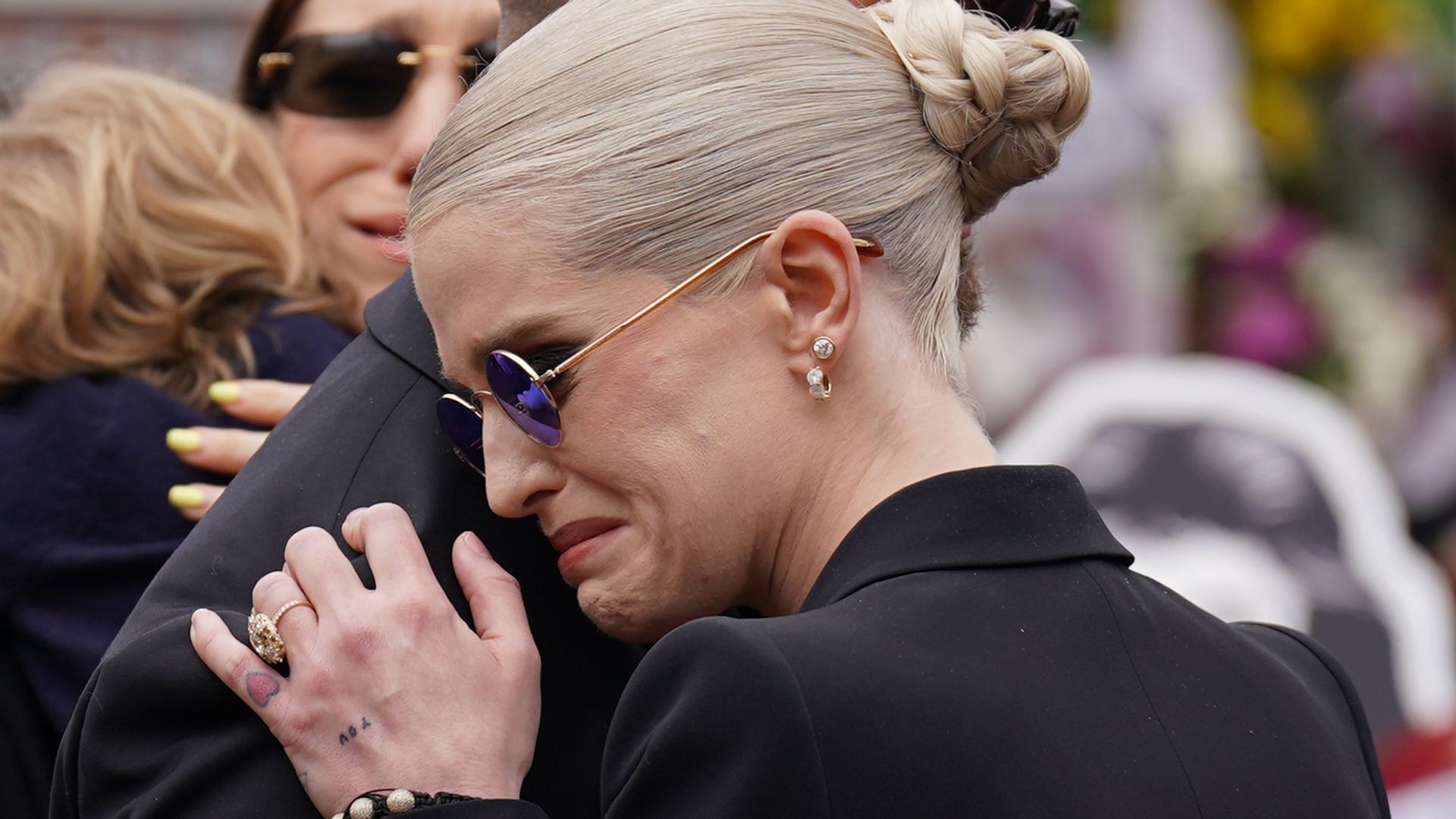 Emotional Kelly Osbourne fights back tears at dad Ozzy's funeral –  heartbreaking photos | HELLO!
