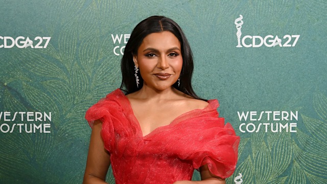 mindy kaling wearing red ball gown 