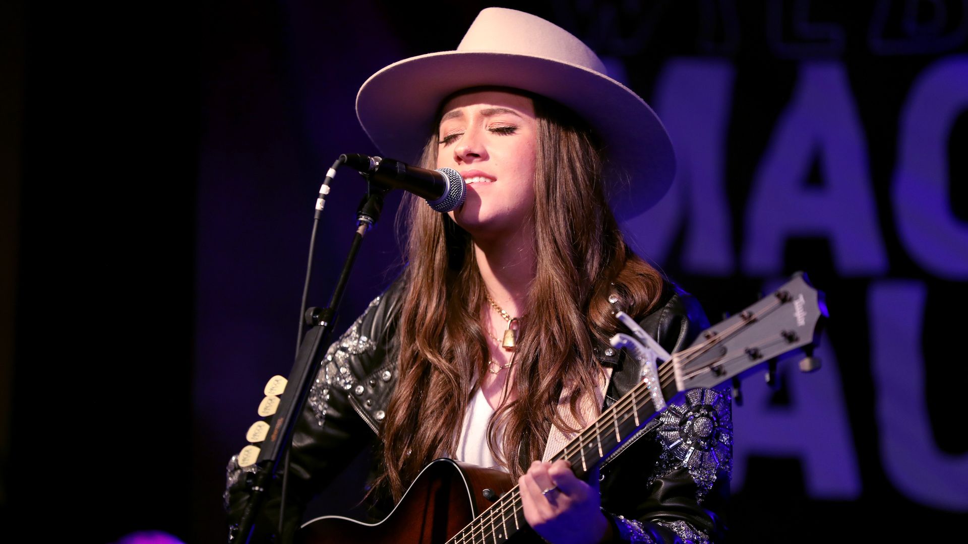 maggie baugh singing guitar