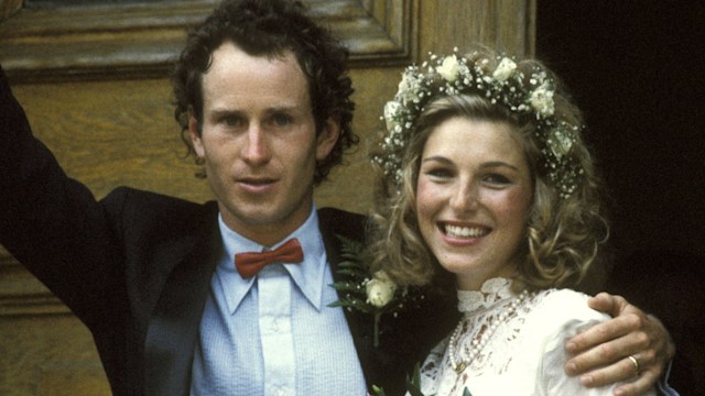 John McEnroe in a suit with his bride Tatum O'Neal in a lacy dress