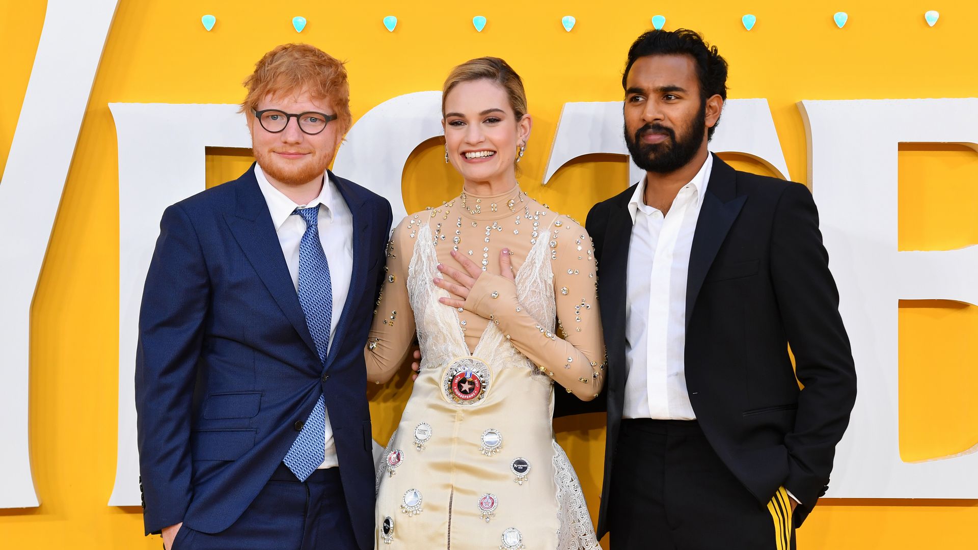 Lily James at the Yesterday premiere alongside Ed Sheeran and Himesh Patel
