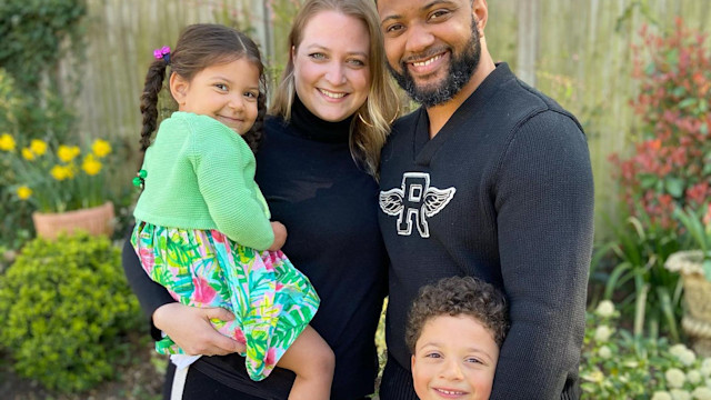 JB Gill with his wife and two children