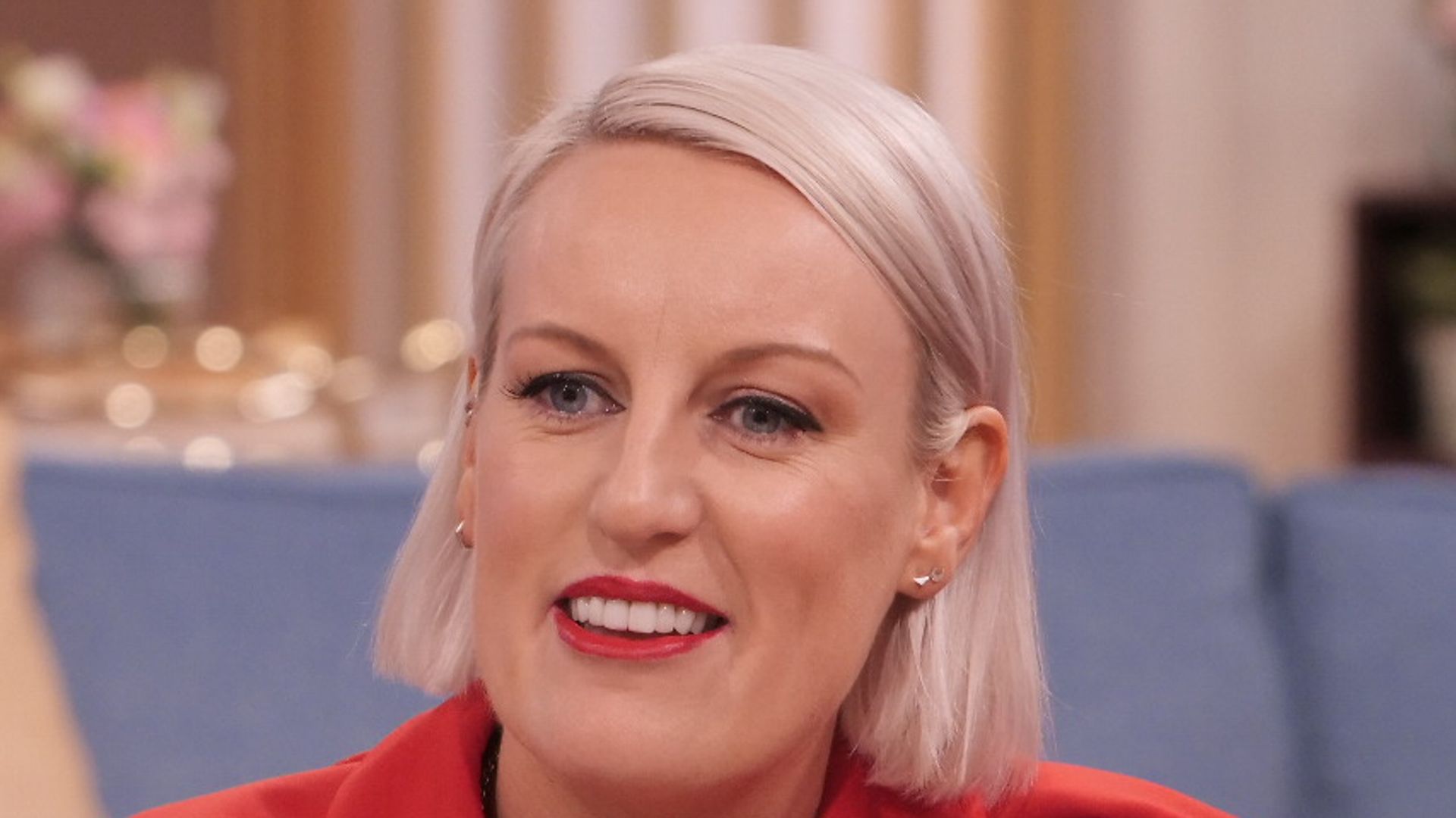 steph mcgovern on this morning in red statement blouse