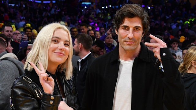 Ashley Benson and Brandon Davis attend a basketball game between the Los Angeles Lakers and the Miami Heat at Crypto.com Arena on January 04, 2023 in Los Angeles, California