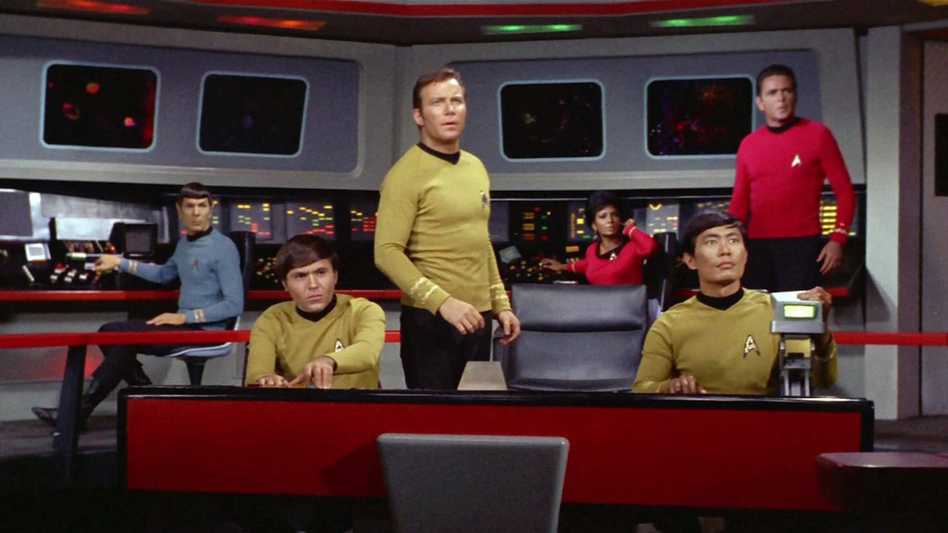 Leonard Nimoy as Mr. Spock, Walter Koenig as Pavel Chekov, William Shatner as Captain James T. Kirk, Nichelle Nichols as Uhura, George Takei as Hikaru Sulu and James Doohan as Montgomery "Scotty" Scott on the bridge of the Starship Enterprise in the STAR TREK episode, "Spock's Brain." Original airdate, September 20, 1968.  Season 3, episode 1.