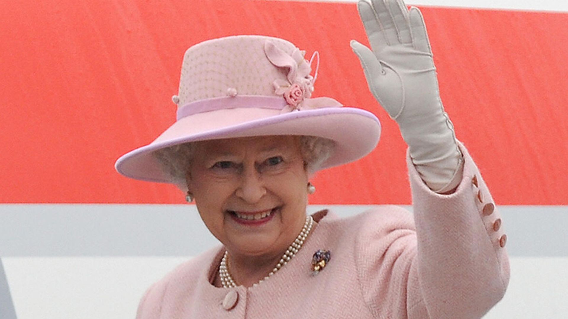 the queen waving
