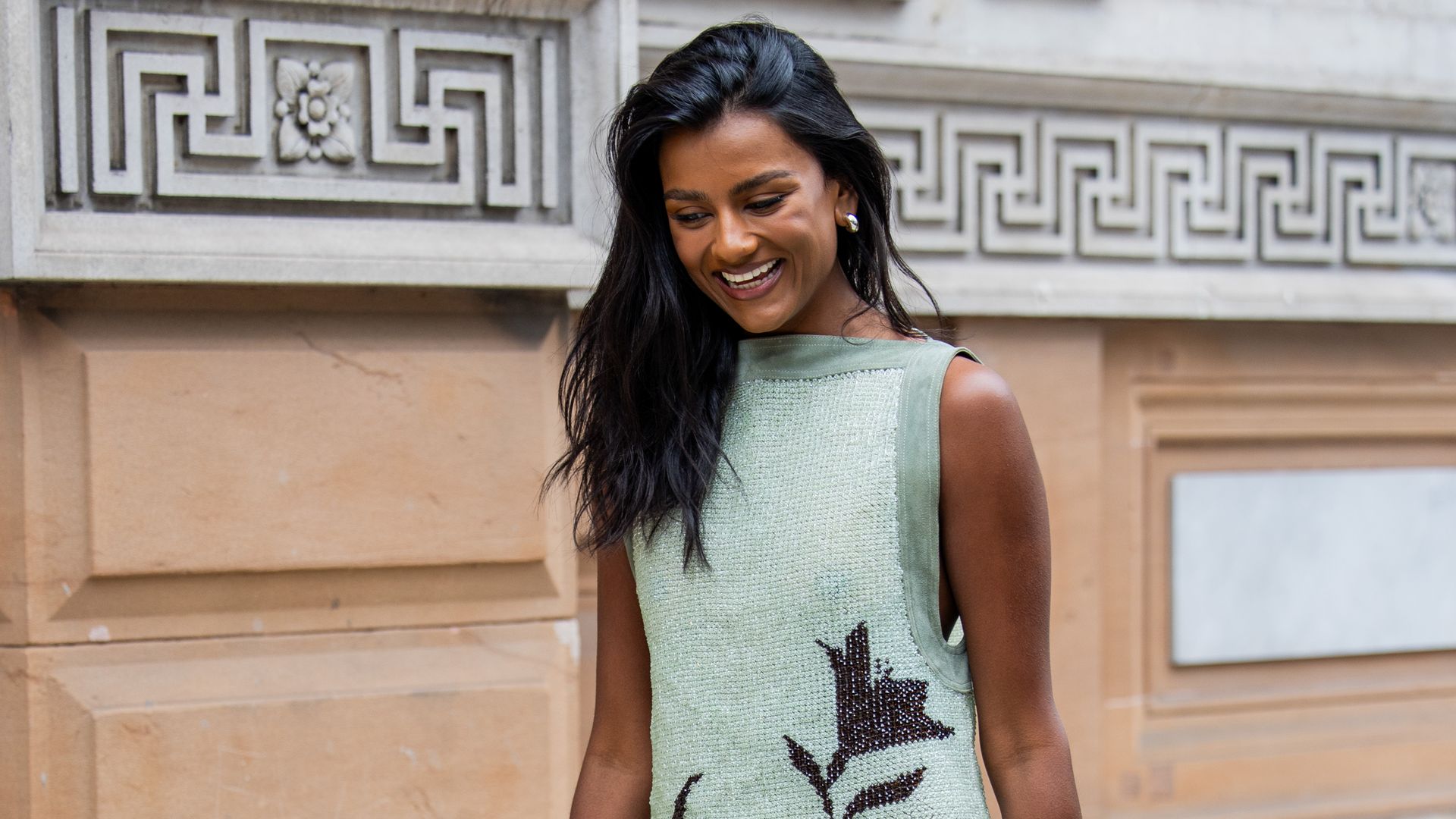 Simone Ashley dazzles in puffball mini dress at Prada show