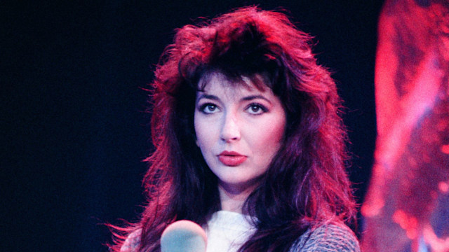 kate bush holding microphone