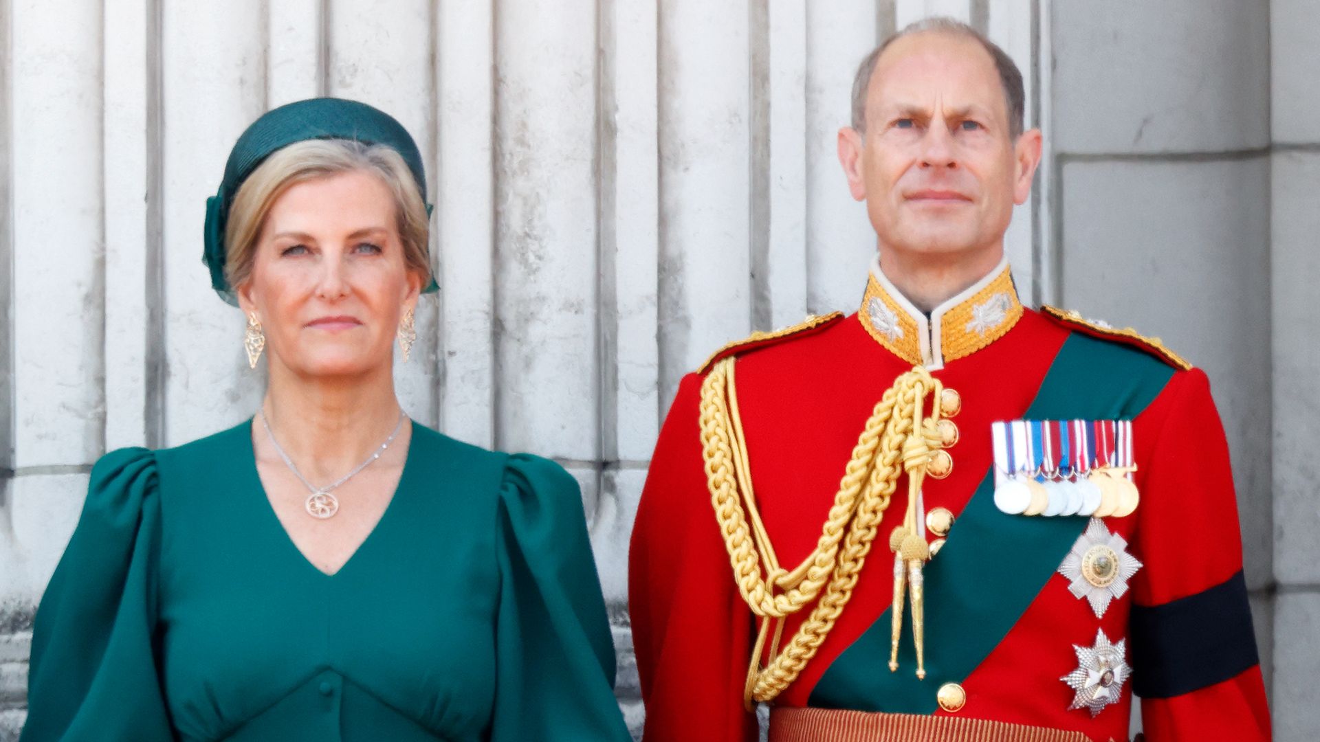 Prince Edward and Sophie standing on palace balcony